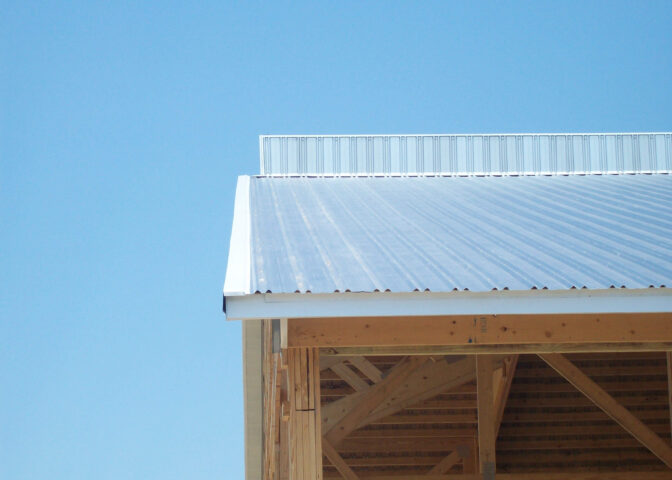 Durable metal siding installed on a large barn